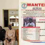 A poster advertising for the search of Boko Haram leader Abubakar Shekau is pasted on a wall in Baga