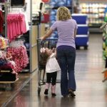 A woman shops with her daughter at a Walmart Supercenter in Rogers