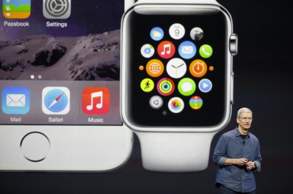 Apple CEO Tim Cook speaks during an Apple event announcing the iPhone 6 and the Apple Watch at the Flint Center in Cupertino