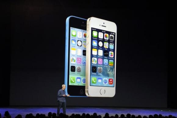 Apple CEO Tim Cook speaks on stage during event at the Flint Center in Cupertino