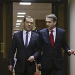 Russia's PM Medvedev and Speaker of State Duma Sergei Naryshkin walk before Medvedev's address to the lower house of parliament in Moscow