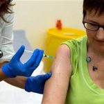 Dr Felicity Hartnell, who is a clinical research fellow at Oxford University, injects former nurse Ruth Atkins the first of 60 healthy volunteers in the U.K