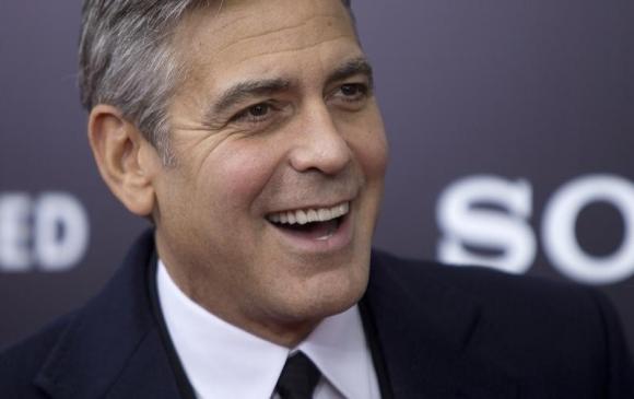 George Clooney arrives for the premiere of his movie "The Monuments Men" in New York