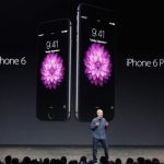 Apple CEO Tim Cook introduces the new iPhone 6 and iPhone 6 Plus during an Apple event at the Flint Center in Cupertino