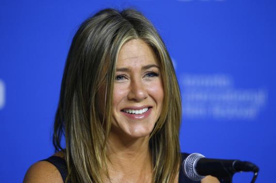 Aniston speaks at the "Cake" news conference at the Toronto International Film Festival in Toronto