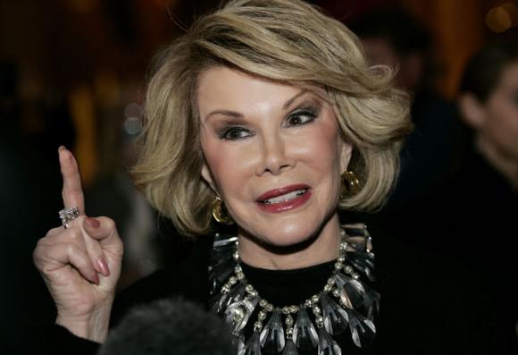 File photo of Comedian Rivers arriving for gala honoring late stand-up comedian Carlin at Kennedy Center in Washington