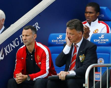 Manchester United manager Van Gaal and his assistant Giggs react during their English Premier League soccer match against Leicester City at the King Power stadium in Leicester
