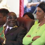 Zimbabwe's President Mugabe and his wife Grace attend a Defence Force Day rally in Harare