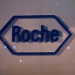 The logo of Swiss pharmaceutical company Roche is seen outside the Shanghai Roche Pharmaceutical Co. Ltd. headquarters in Shanghai