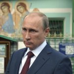 Russia's President Putin leaves the Life-giving Trinity church in Moscow