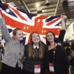Supporters from the "No" Campaign celebrate as they hold up a Union flag, in Edinburgh, Scotland