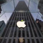 The leaf on the Apple symbol is tinted green at the Apple flagship store on 5th Ave in New York April 22, 2014. REUTERS/Brendan McDermid