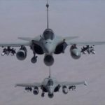 Handout shows two French Rafale fighter jets flying in formation during a mission from the Al-Dhafra airbase