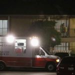 A Red Cross worker delivers bedding materials to an apartment unit at The Ivy Apartments, where a man diagnosed with the Ebola virus was staying in Dallas, Texas