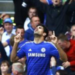 Chelsea's Costa celebrates scoring a goal against Arsenal during their English Premier League soccer match at Stamford Bridge in London