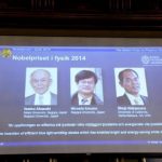 Japanese scientists Akasaki and Amano, and U.S. scientist Nakamura are seen on a screen after being announced as the 2014 Nobel Physics Laureates in Stockholm