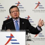 European Commission President Barroso gestures during news conference at the Europe-Asia summit in Milan