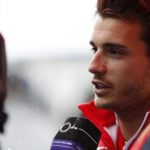 Marussia Formula One driver Bianchi of France speaks to the media after a news conference at the Suzuka circuit
