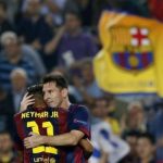 Barcelona's Messi is congratulated by his teammate Neymar after scoring a goal against Ajax Amsterdam during their Champions League soccer match in Barcelona