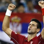 Novak Djokovic of Serbia celebrates winning his men's singles tennis match against David Ferrer of Spain at the Shanghai Masters tennis tournament in Shanghai