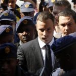 Olympic and Paralympic track star Oscar Pistorius arrives at the North Gauteng High Court in Pretoria