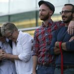 Plaintiffs Kody Partridge and her wife Laurie Wood, Derek Kitchen and his partner Moudi Sbeity attend a same-sex marriage rally in Salt Lake City, Utah