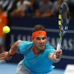 Spain's Rafael Nadal returns the ball to Simone Bolelli of Italy during their tennis match at the Swiss Indoors ATP tournament in Basel