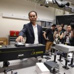 Japanese-born U.S. citizen Nakamura talks about a laser in a lab after winning the 2014 Nobel Prize for Physics, at the University of California Santa Barbara in Isla Vista