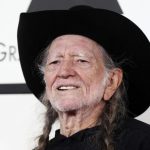 Musician Willie Nelson arrives at the 56th annual Grammy Awards in Los Angeles