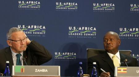 Zambia Vice President Guy Scott and Uganda President Yoweri Kaguta Museveni listen to U.S. President Barack Obama at the first Leaders Session of the U.S.-Africa Leaders Summit at the State Department in Washington