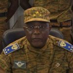 Burkina Faso's military chief General Honore Traore speaks at a news conference announcing his takeover of power, at army headquarters in Ouagadougou