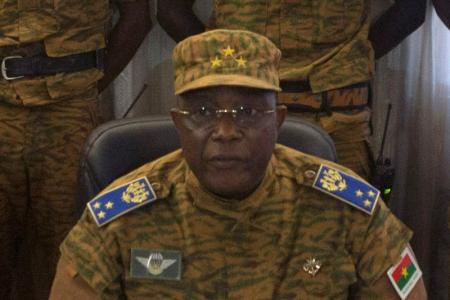 Burkina Faso's military chief General Honore Traore speaks at a news conference announcing his takeover of power, at army headquarters in Ouagadougou