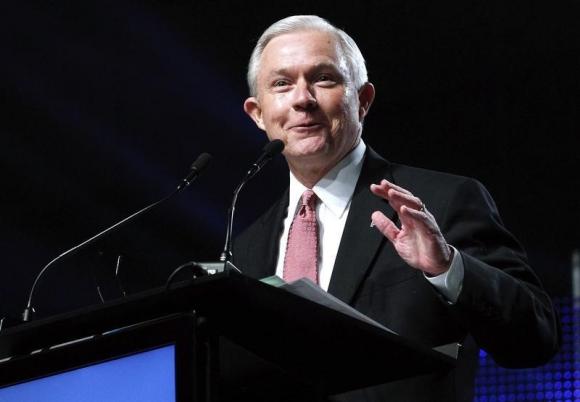 United States Senator Jeff Sessions speaks during a news conference in Mobile