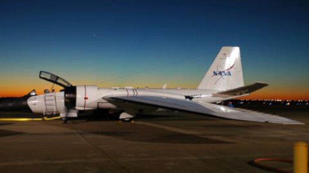 A NASA WB-57 photographed at dawn