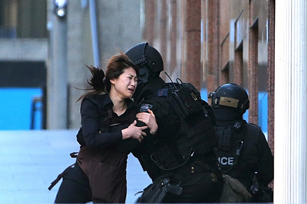 A hostage ran to tactical response police officers after she escaped