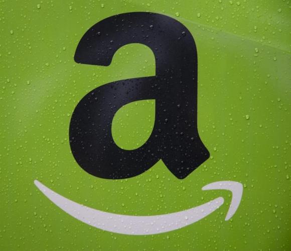 The Amazon.com, Inc. logo is seen on the side of a delivery truck in Brooklyn, New Yor