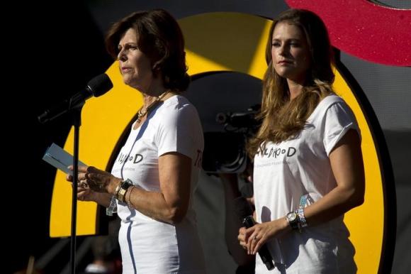 Princess Madeleine of Sweden and Queen Silvia of Sweden make an introduction during the Global Citizen Festival concert in Central Park in New York