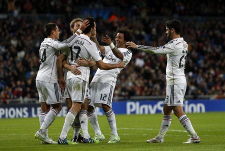 Real Madrid's Arbeloa celebrates scoring against Ludogorets with teammates during their Champions League soccer match in Madrid