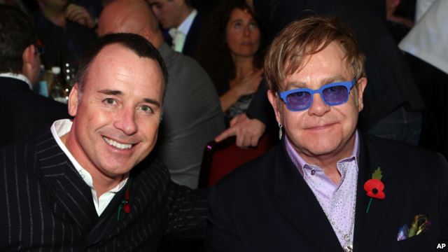 Sir Elton John (R) and David