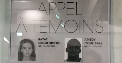 A wanted poster in the Paris Metro