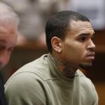 Singer Chris Brown, who pleaded guilty to assaulting his girlfriend Rihanna, appears in court with his lawyer Mark Geragos for a progress hearing, in Los Angeles