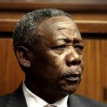 Jackie Selebi , the former head of South Africa's police force, looks on during his sentencing at a South African court in Johannesburg