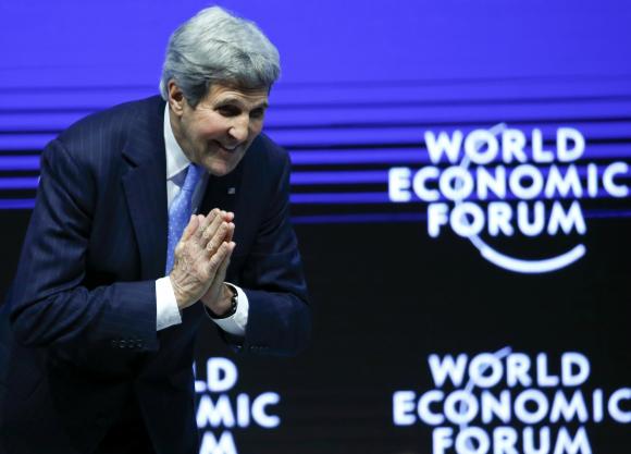 U.S. Secretary of State Kerry acknowledges the public after making a special address at the World Economic Forum in the Swiss mountain resort of Davos