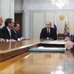 Russian President Vladimir Putin chairs a meeting with members of the Security Council at the Novo-Ogaryovo state residence outside Moscow