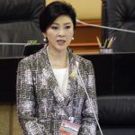 Ousted former Prime Minister Yingluck Shinawatra delivers her statement at the National Legislative Assembly meeting in Bangkok