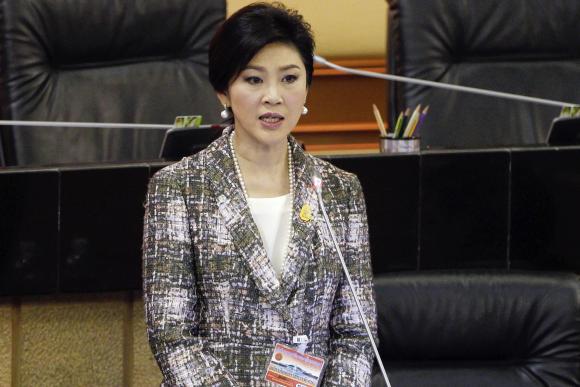 Ousted former Prime Minister Yingluck Shinawatra delivers her statement at the National Legislative Assembly meeting in Bangkok