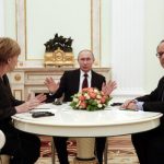 German Chancellor Merkel, Russia's President Putin and French President Hollande attend a meeting on resolving the Ukraine crisis at the Kremlin in Moscow