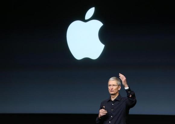 Apple CEO Tim Cook speaks during a presentation at Apple headquarters in Cupertino