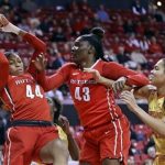 Betnijah Laney, left, Ariel Butts and Maryland