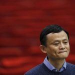 Alibaba Group Holding Ltd chairman Jack Ma reacts as he speaks to journalists after holding a talk by Our Hong Kong Foundation in Hong Kong
